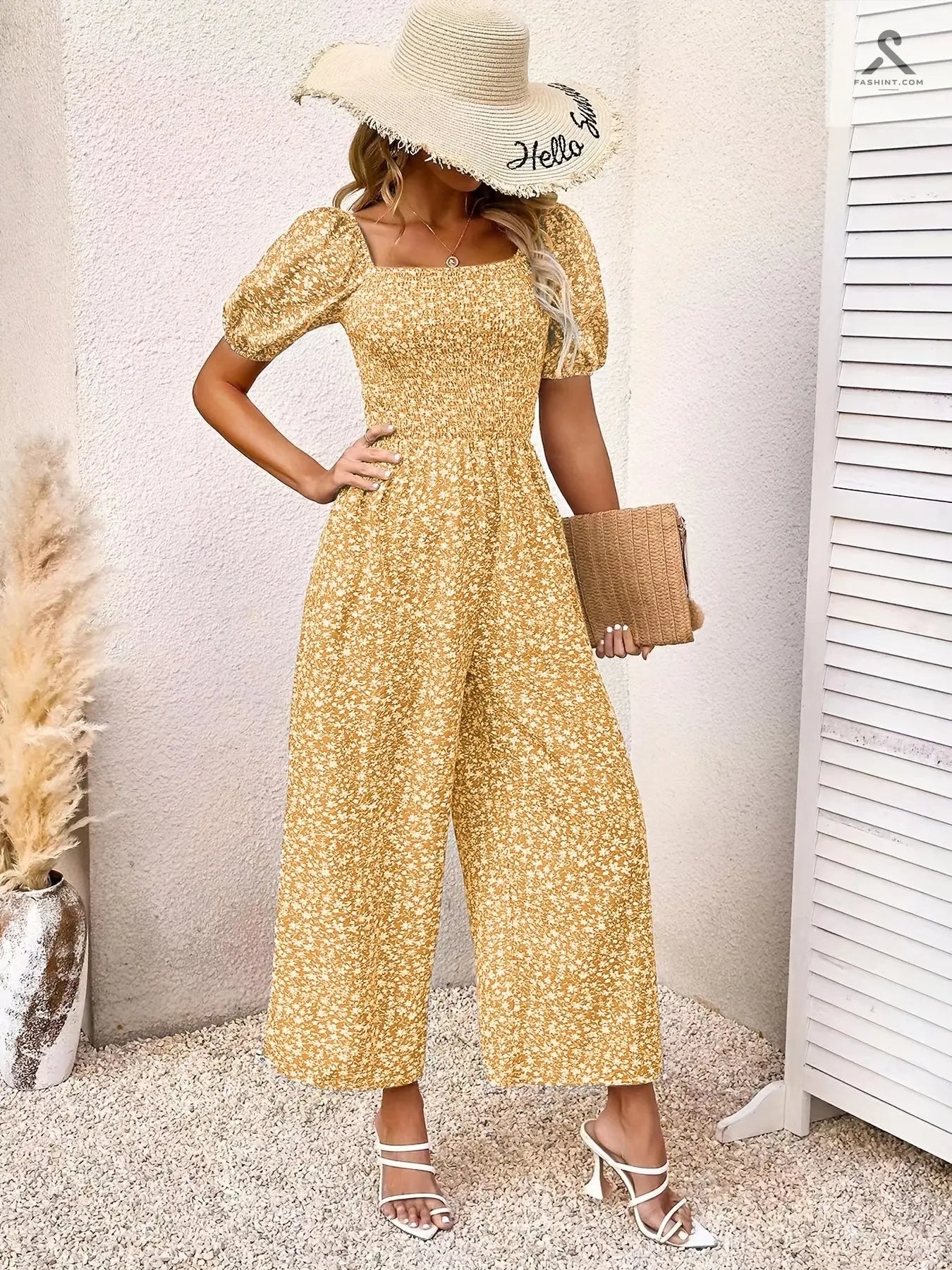 جمبسوت مزين بطباعة زهور وبأكمام منفوخة Fashint