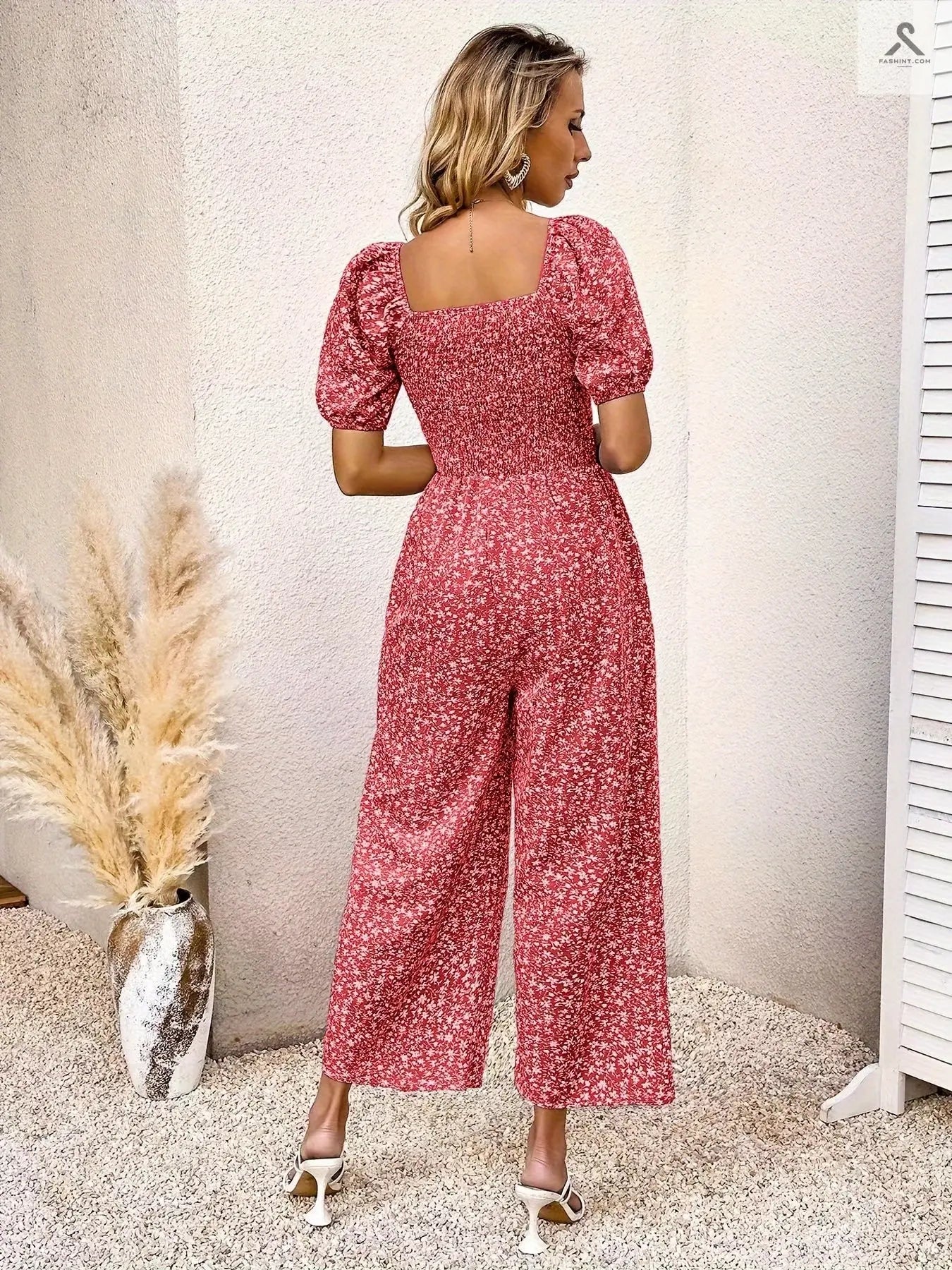 جمبسوت مزين بطباعة زهور وبأكمام منفوخة Fashint