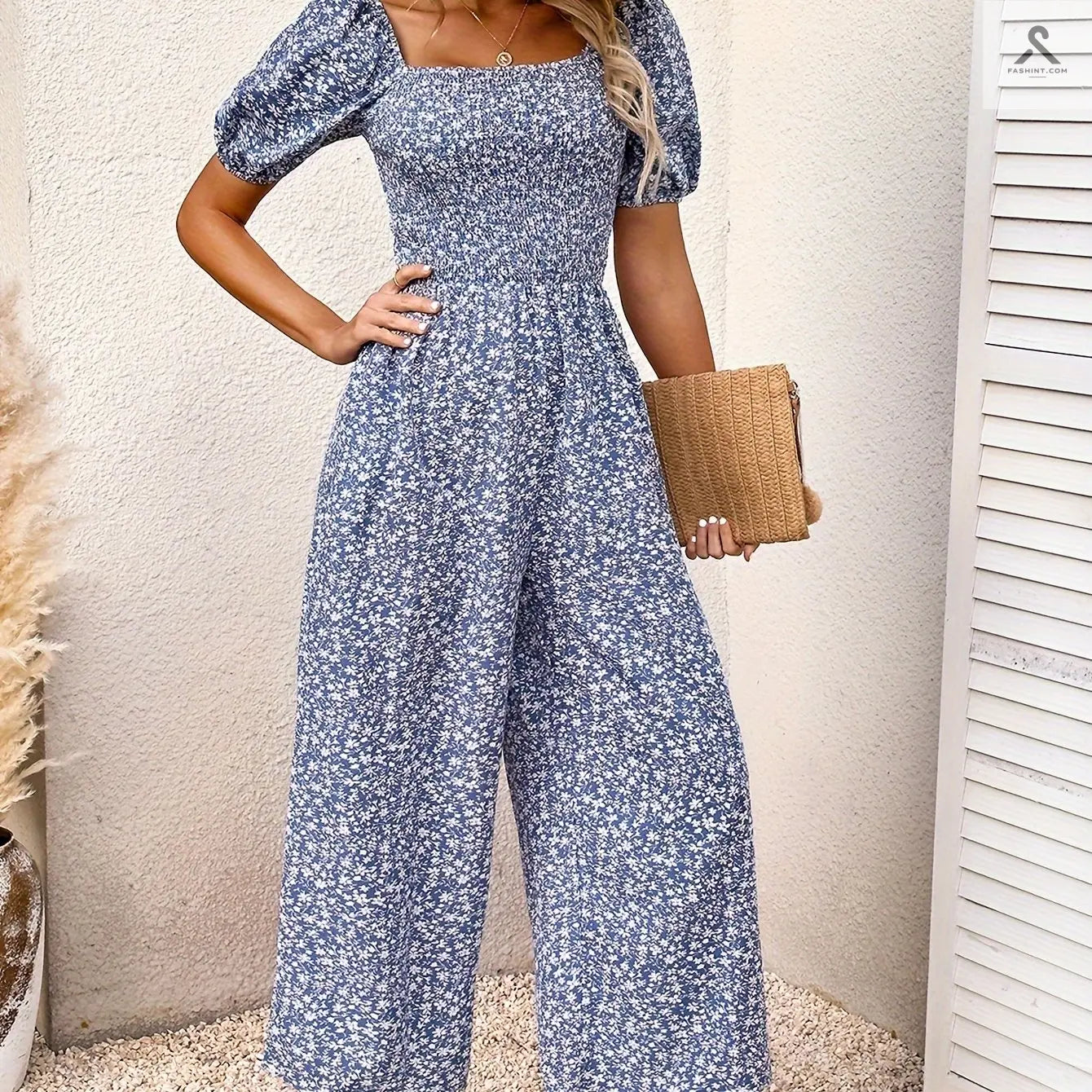 جمبسوت مزين بطباعة زهور وبأكمام منفوخة Fashint