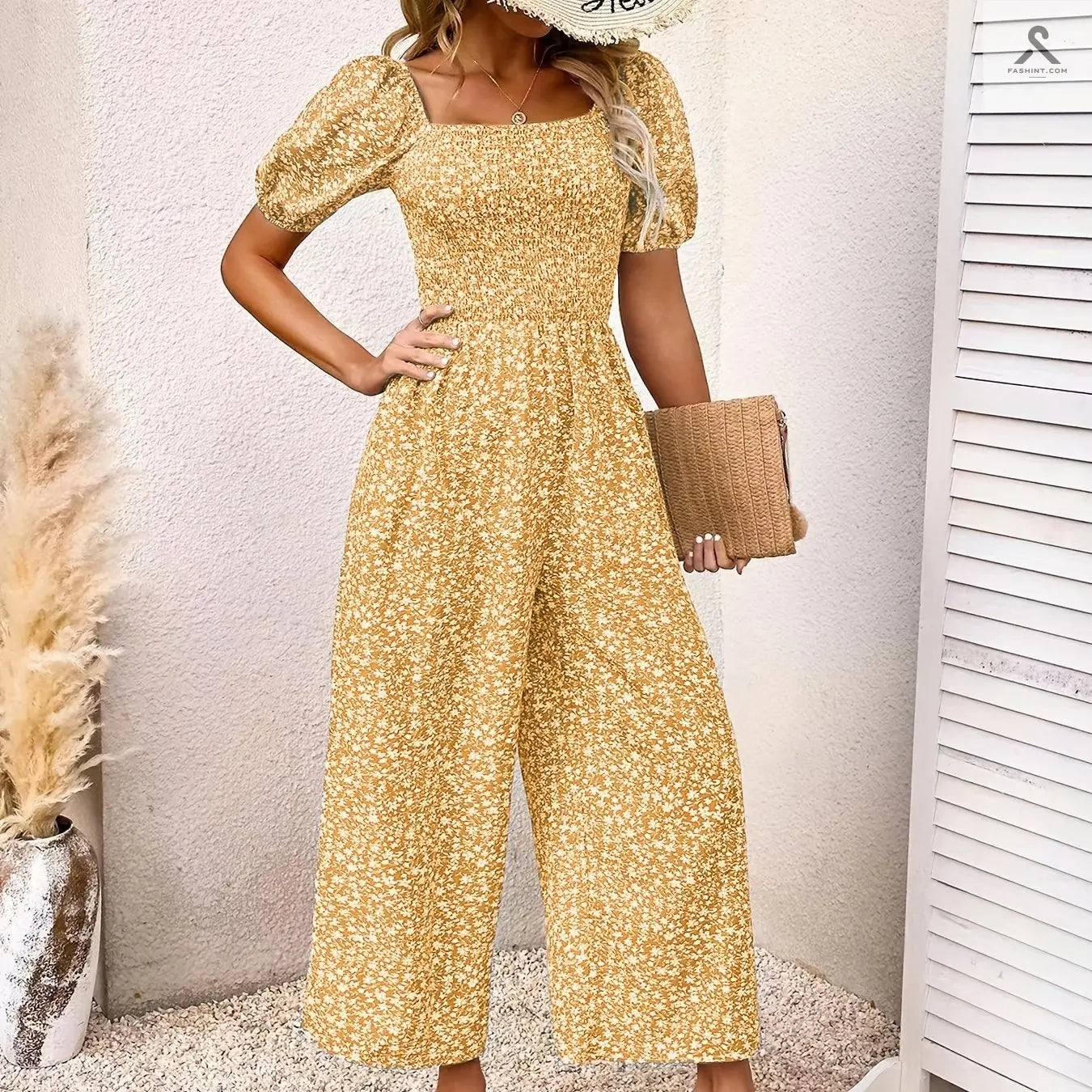 جمبسوت مزين بطباعة زهور وبأكمام منفوخة Fashint