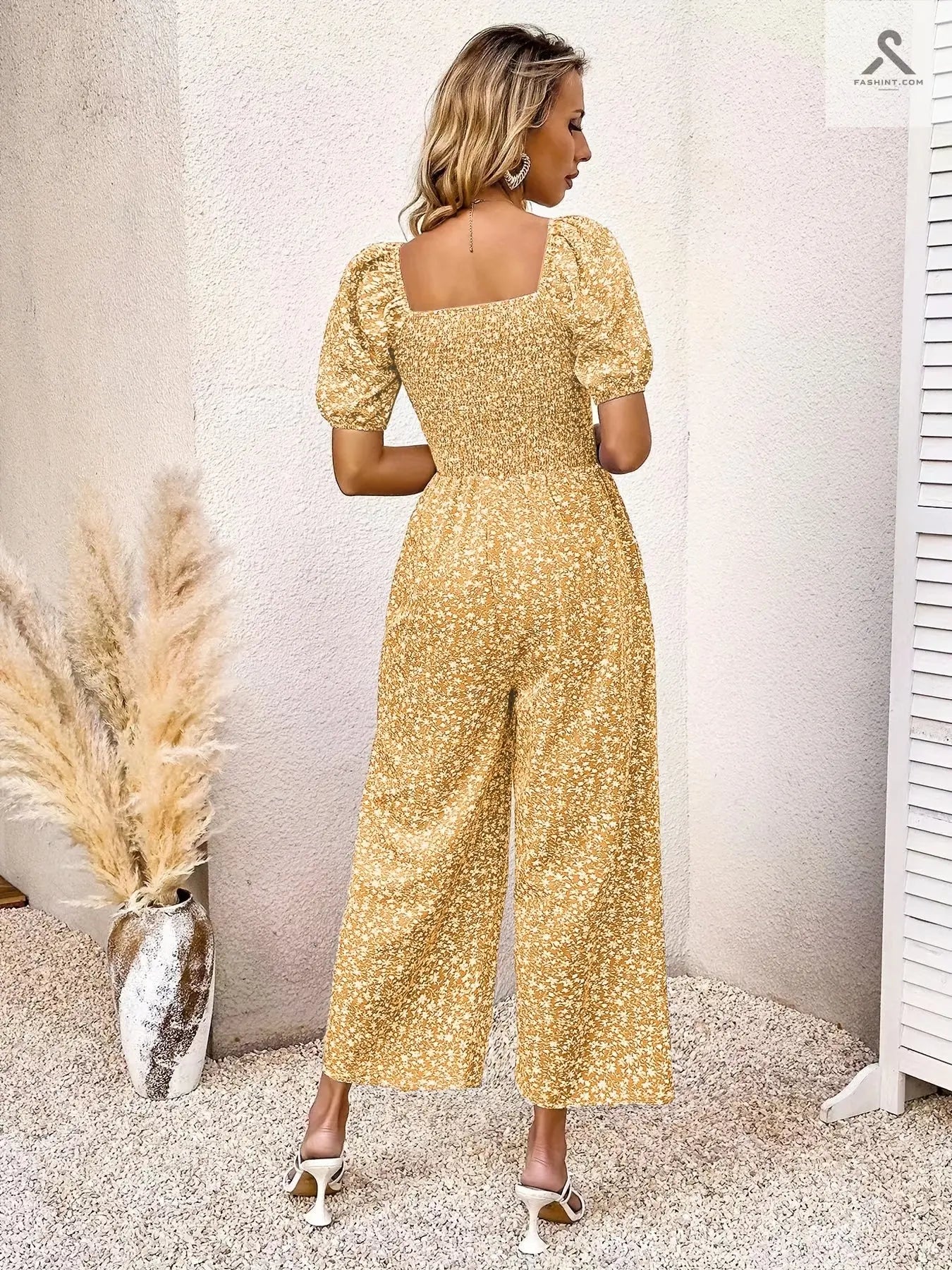 جمبسوت مزين بطباعة زهور وبأكمام منفوخة Fashint